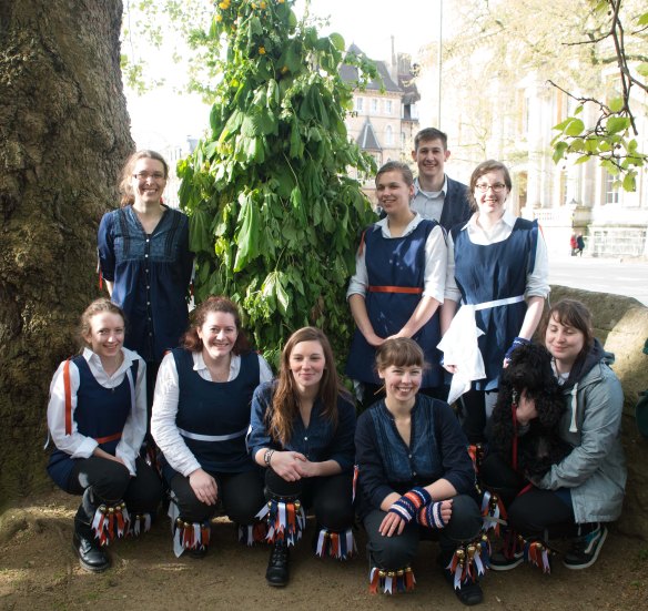 Team photo with Jack-in-the-Green (man covered in leaves)